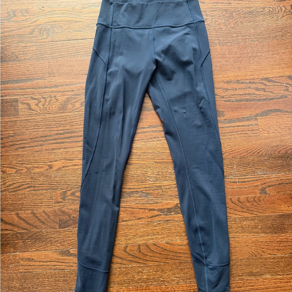 lululemon athletica full length mid waisted navy blue leggings. Size 6.